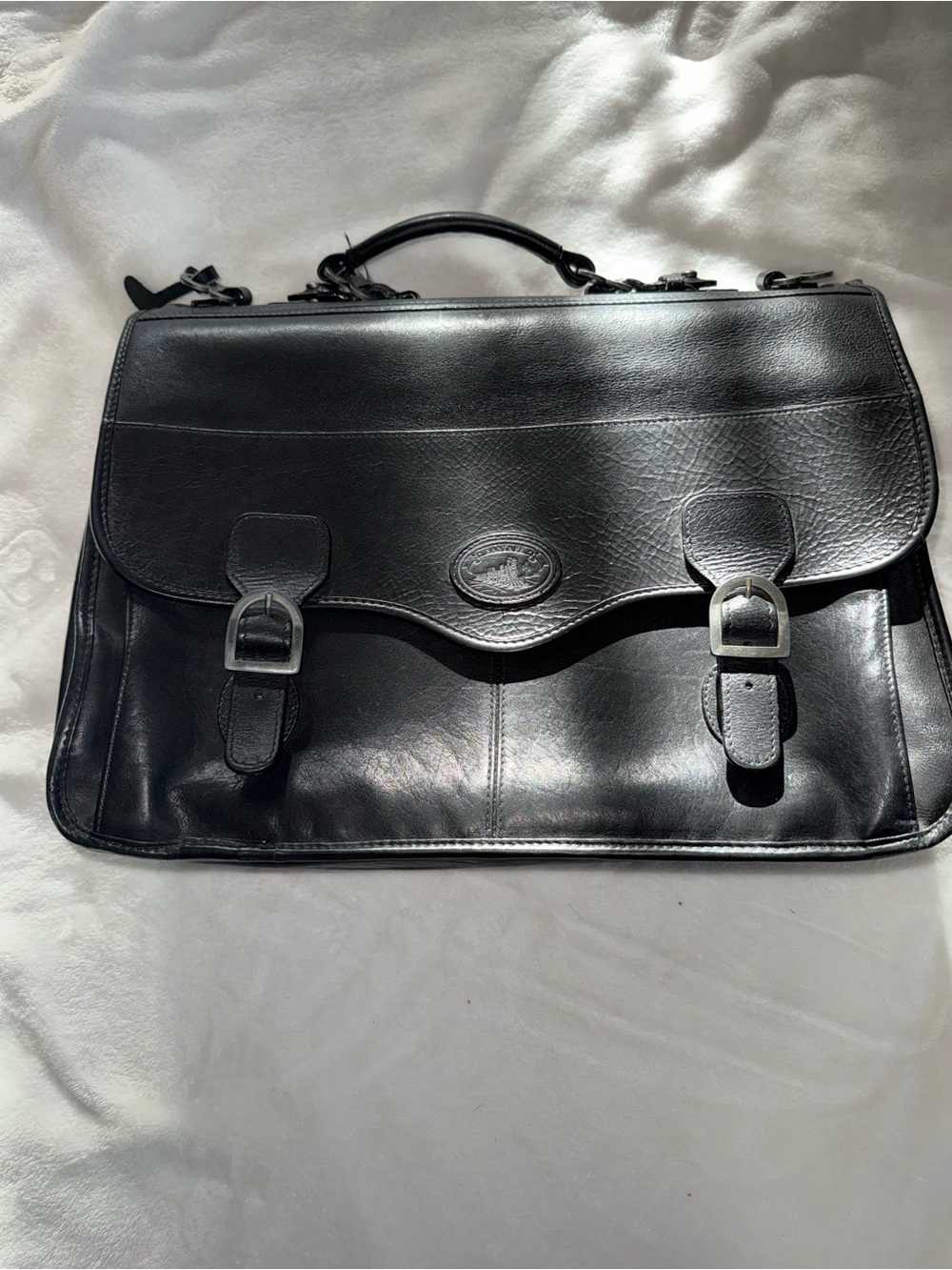 Santa Fe laptop flap briefcase is crafted from full-grain leather
